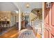 Bright and spacious entryway with hardwood floors and staircase at 4458 Paces Battle Nw, Atlanta, GA 30327
