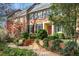 Brick front of charming home with landscaping and inviting walkway at 4458 Paces Battle Nw, Atlanta, GA 30327