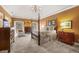 Serene main bedroom featuring a vaulted ceiling, large windows, and elegant furnishings at 4458 Paces Battle Nw, Atlanta, GA 30327