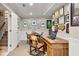 Home office boasts a wood desk, built-in shelving, and natural lighting at 4458 Paces Battle Nw, Atlanta, GA 30327