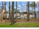 Townhome complex backing to wooded area offers privacy and nature views at 4458 Paces Battle Nw, Atlanta, GA 30327