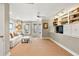 Bright sitting room with built-in bookcases, plush seating, neutral walls, and French doors leading to outdoor area at 4458 Paces Battle Nw, Atlanta, GA 30327