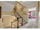 Classic staircase with carpeted steps and wood railings, leading to the upper level at 4458 Paces Battle Nw, Atlanta, GA 30327