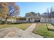Spacious backyard featuring a deck, screened porch, and fenced yard at 1522 Waltham Se Pl, Atlanta, GA 30316