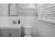 Bathroom with white fixtures, a vanity, and a neutral color scheme at 1522 Waltham Se Pl, Atlanta, GA 30316
