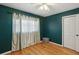 Bedroom featuring hardwood floors, a ceiling fan, and a closet at 1522 Waltham Se Pl, Atlanta, GA 30316