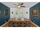 Inviting dining room with wood table, ceiling fan, and French doors to the backyard at 1522 Waltham Se Pl, Atlanta, GA 30316