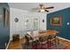 Dining room featuring hardwood floors, a wooden table, and a view to the outside patio at 1522 Waltham Se Pl, Atlanta, GA 30316