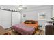 Bedroom with white walls, natural light, and rustic barn doors at 1522 Waltham Se Pl, Atlanta, GA 30316