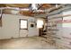 Unfinished basement area with storage shelving at 10155 Twin Oaks Sw Dr, Covington, GA 30014