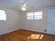 Spacious bedroom with hardwood floors and a ceiling fan at 10155 Twin Oaks Sw Dr, Covington, GA 30014