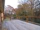 Wooden deck overlooking a wooded backyard at 10155 Twin Oaks Sw Dr, Covington, GA 30014