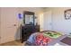 The bedroom features a sleek black dresser with a mirror, offering ample storage and a clean aesthetic at 257 Orwell Dr, Social Circle, GA 30025