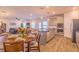 Open-concept kitchen with stainless steel appliances and island seating at 257 Orwell Dr, Social Circle, GA 30025