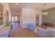 Cozy living space with hardwood floors, a decorative wall, and comfortable seating at 257 Orwell Dr, Social Circle, GA 30025