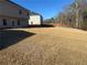Large backyard with new sod, offering a peaceful and private setting at 333 Orwell Dr, Social Circle, GA 30025