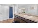 Bathroom with double vanity and bathtub at 333 Orwell Dr, Social Circle, GA 30025