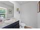 Simple bathroom with single vanity and toilet at 333 Orwell Dr, Social Circle, GA 30025