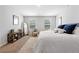 Spacious main bedroom with neutral decor and plenty of natural light at 333 Orwell Dr, Social Circle, GA 30025