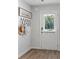 Inviting entryway with wood-look floors and coat rack at 333 Orwell Dr, Social Circle, GA 30025