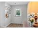 Bright entryway, featuring a stylish coat rack and lamp at 333 Orwell Dr, Social Circle, GA 30025