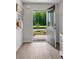Inviting entryway with wood-look flooring and view of the front yard at 333 Orwell Dr, Social Circle, GA 30025