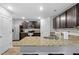 Modern kitchen with granite countertops and stainless steel appliances at 333 Orwell Dr, Social Circle, GA 30025