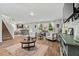 Spacious living room with hardwood floors and ample natural light at 333 Orwell Dr, Social Circle, GA 30025