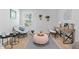 Bright and airy home office features a desk and relaxing seating area at 333 Orwell Dr, Social Circle, GA 30025