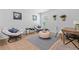 Cozy office or sitting area with comfortable chairs and a work desk at 333 Orwell Dr, Social Circle, GA 30025