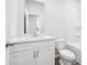 Clean bathroom featuring vanity with white cabinets and a shower-tub combo at 6900 Winchester Pl, Fairburn, GA 30213