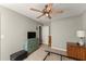Bedroom with neutral carpet and a ceiling fan has lots of space for relaxing and sleeping at 2352 Kelman Pl, Dacula, GA 30019