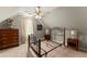 Upstairs bedroom with slanted ceiling, neutral walls, carpeted floors and ceiling fan at 2352 Kelman Pl, Dacula, GA 30019