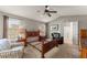 Spacious bedroom featuring neutral walls, ceiling fan, and carpeted floors, creating a relaxing atmosphere at 2352 Kelman Pl, Dacula, GA 30019
