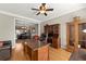 Spacious home office features wood cabinets, built-ins, and a comfortable seating area at 2352 Kelman Pl, Dacula, GA 30019
