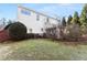 Two-story house with backyard and landscaping at 2352 Kelman Pl, Dacula, GA 30019
