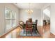 Dining room with hardwood floors, chandelier, and a large window at 2818 Colleton Dr, Marietta, GA 30066