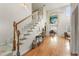 Grand entryway features hardwood floors, stairs, and a view to the dining room at 2818 Colleton Dr, Marietta, GA 30066