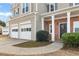A close up exterior view of the two car garage and front door entrance at 2818 Colleton Dr, Marietta, GA 30066