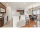 Open kitchen area features dark wood cabinets and a breakfast bar at 2818 Colleton Dr, Marietta, GA 30066