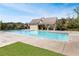 Large in ground community pool with a bath house and ample seating for residents and guests at 6120 Sparrow Ln, Cumming, GA 30028