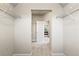 Spacious walk-in closet with wire shelving provides ample storage and organization at 6120 Sparrow Ln, Cumming, GA 30028