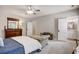 Bright bedroom featuring a comfortable sitting area and en-suite bathroom at 5341 Hill Nw Rd, Acworth, GA 30101