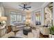 Light and airy Gathering room with comfortable seating and access to screened porch at 5341 Hill Nw Rd, Acworth, GA 30101