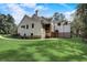Stunning home exterior with large backyard and screened porch at 5341 Hill Nw Rd, Acworth, GA 30101