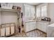 Well-equipped laundry room with ample counter and cabinet space at 5341 Hill Nw Rd, Acworth, GA 30101