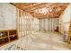 Unfinished basement with framed walls and exposed insulation at 5341 Hill Nw Rd, Acworth, GA 30101