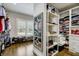 Large walk-in closet with ample shelving and hanging space at 5341 Hill Nw Rd, Acworth, GA 30101