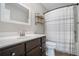 Clean bathroom with a shower/tub combo and vanity at 514 Perdue Trl, Canton, GA 30115