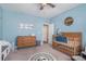 Charming Bedroom featuring a crib and dresser at 514 Perdue Trl, Canton, GA 30115